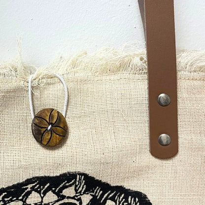 Bolso de material Natural con asa de Piel